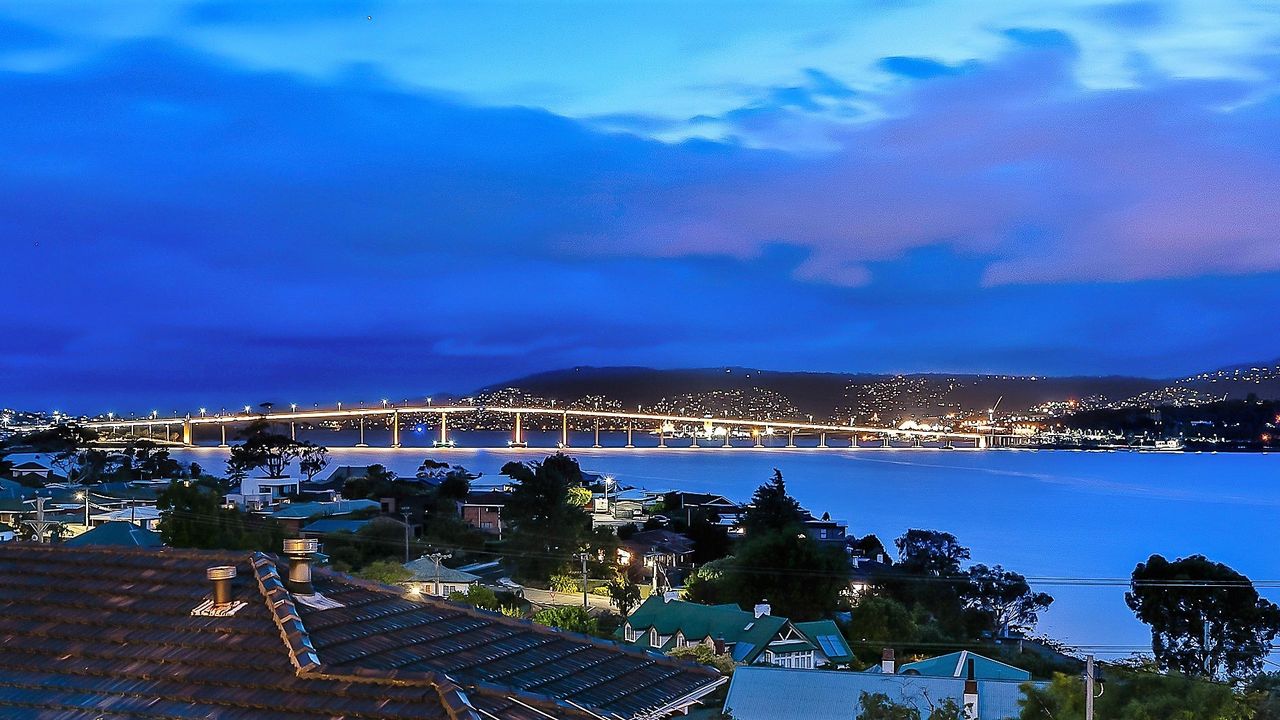 Deep Blue Wow views over river city mountain