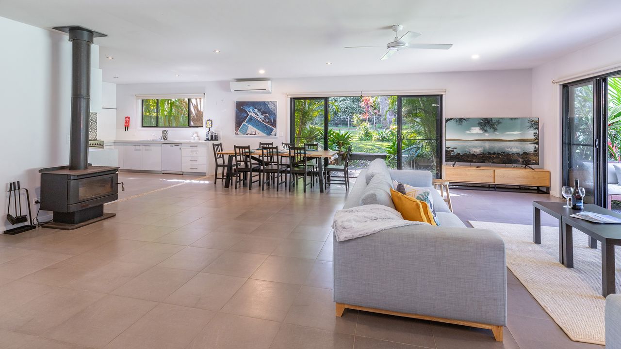 Spacious Living and Dining Area with Fireplace