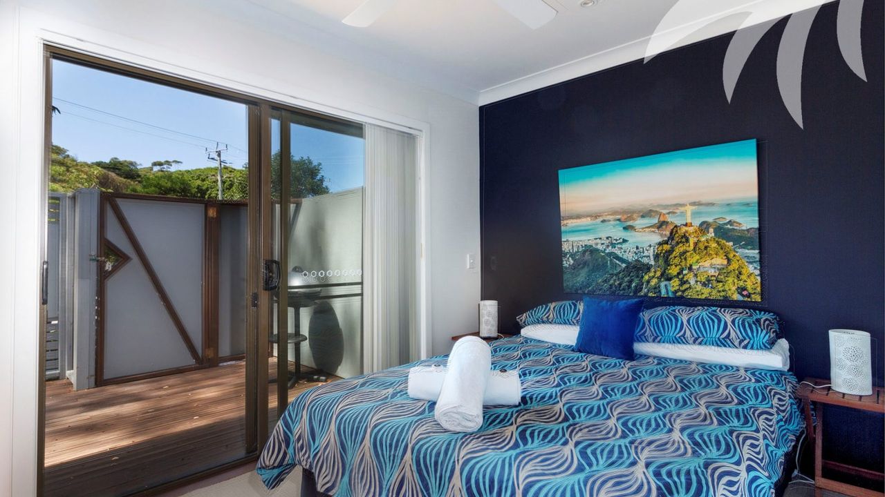 Bedroom with Queen Bed and Deck Access