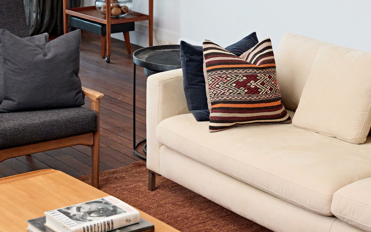 Sink into low cream sofa