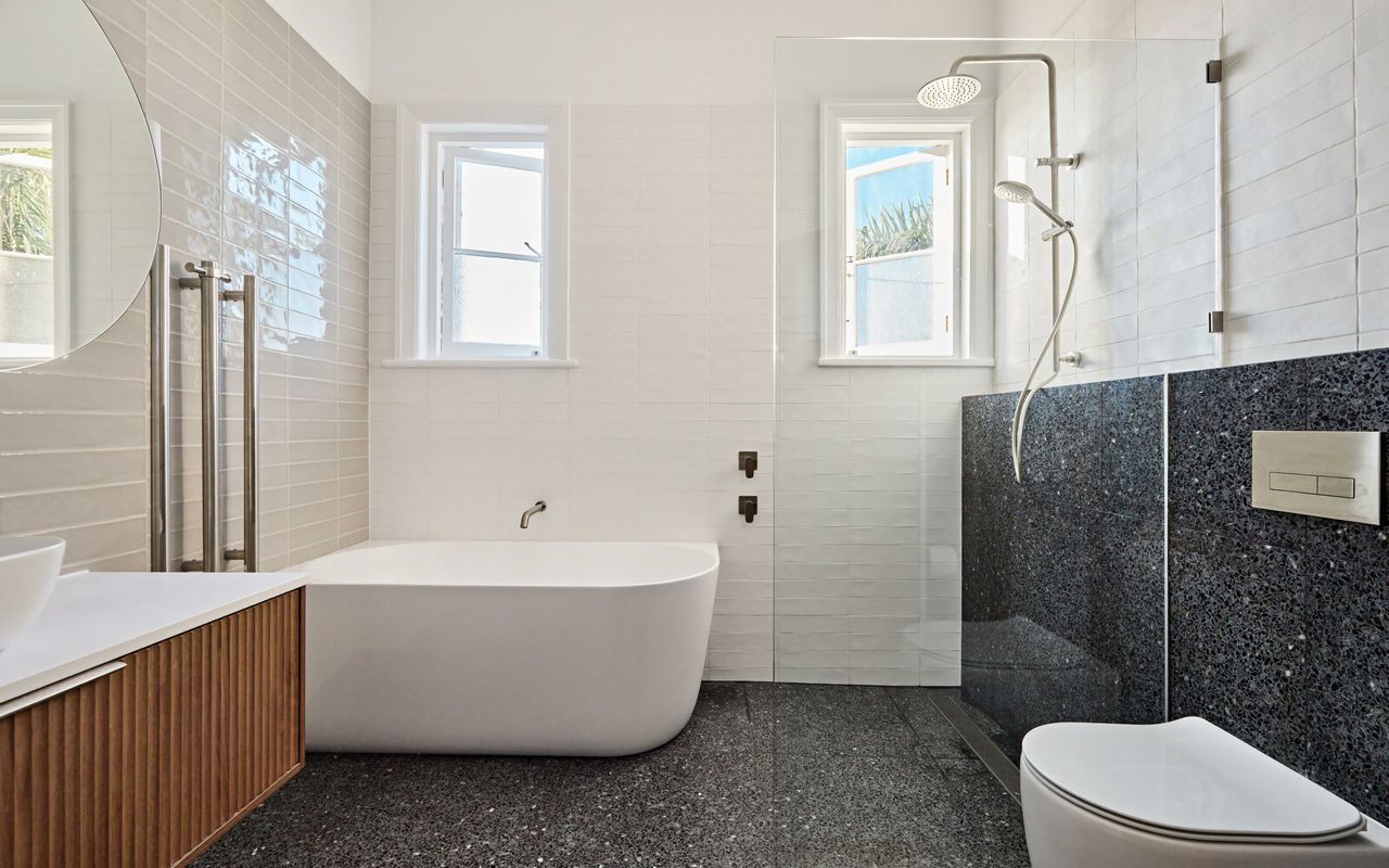 Modern bathroom featuring a clean, stylish toilet