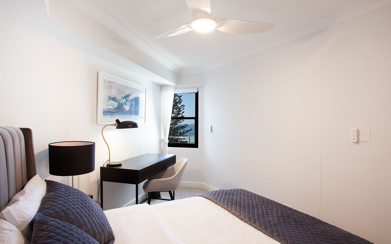 Bedroom with dedicated workplace