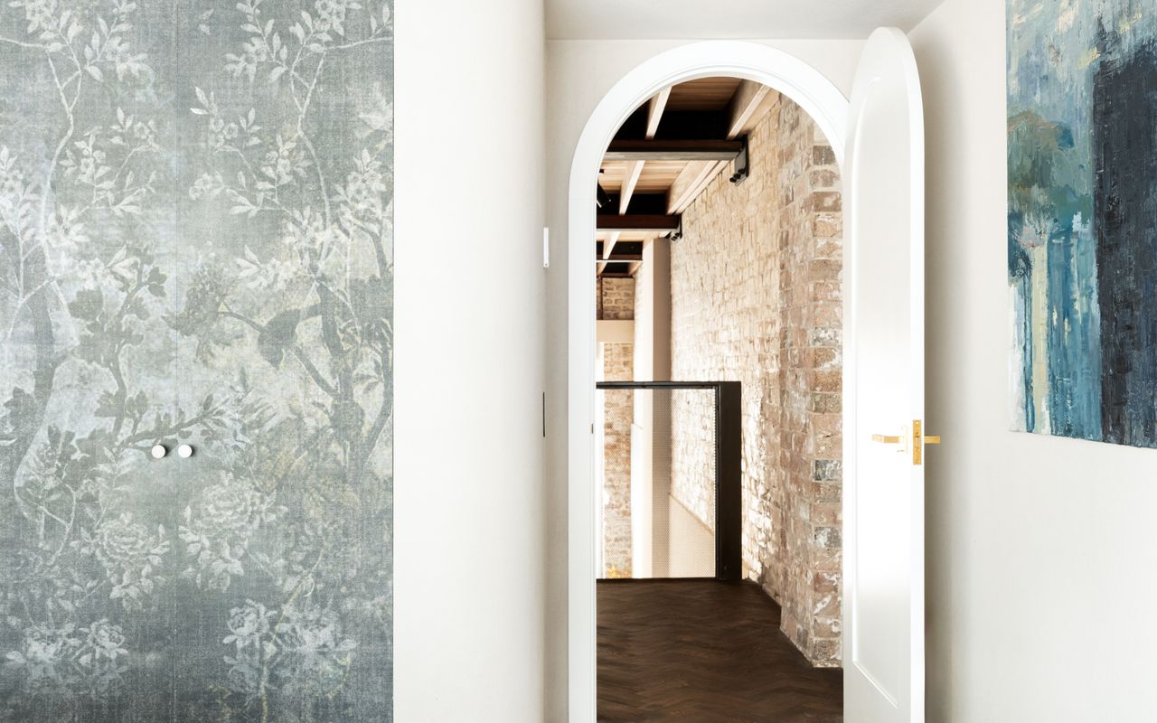 Captivated by exposed brick and lofty ceilings.