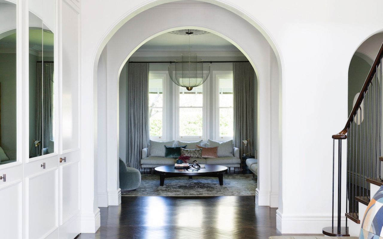 Opulent living spaces with dramatic chandeliers and stylish decor.