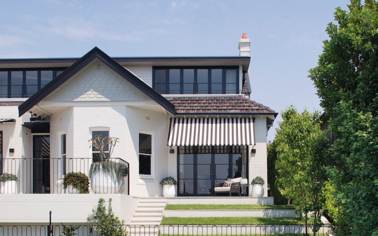 Manicured gardens and inviting grassed areas for outdoor enjoyment.