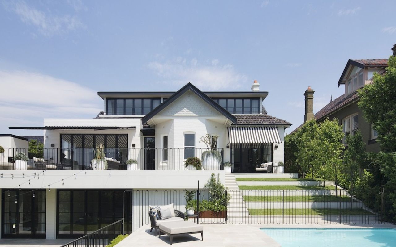 Heated pool and sun loungers offer a slice of Palm Springs in Mosman.