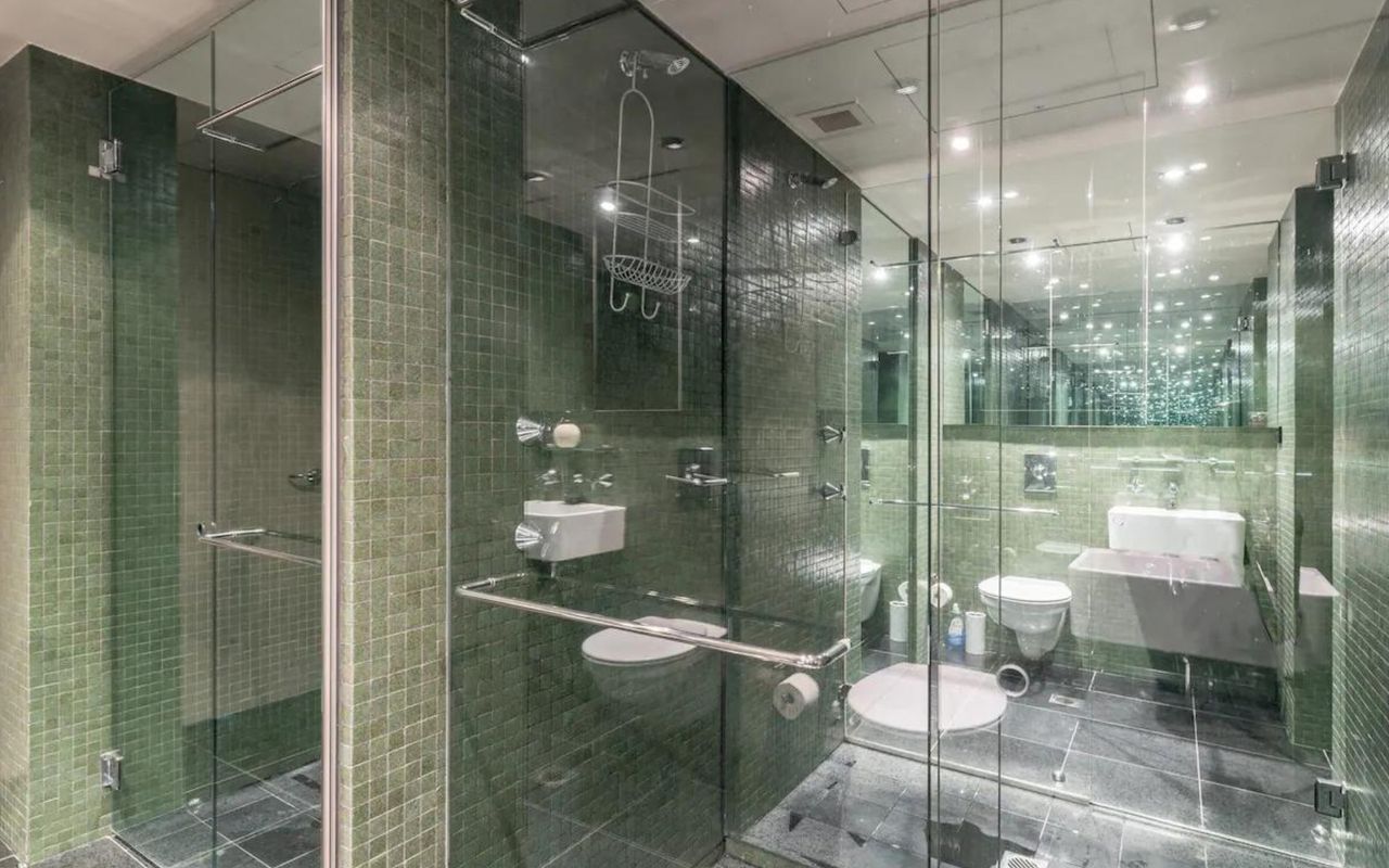 Luxuriate in our sleek and modern bathroom sanctuary.