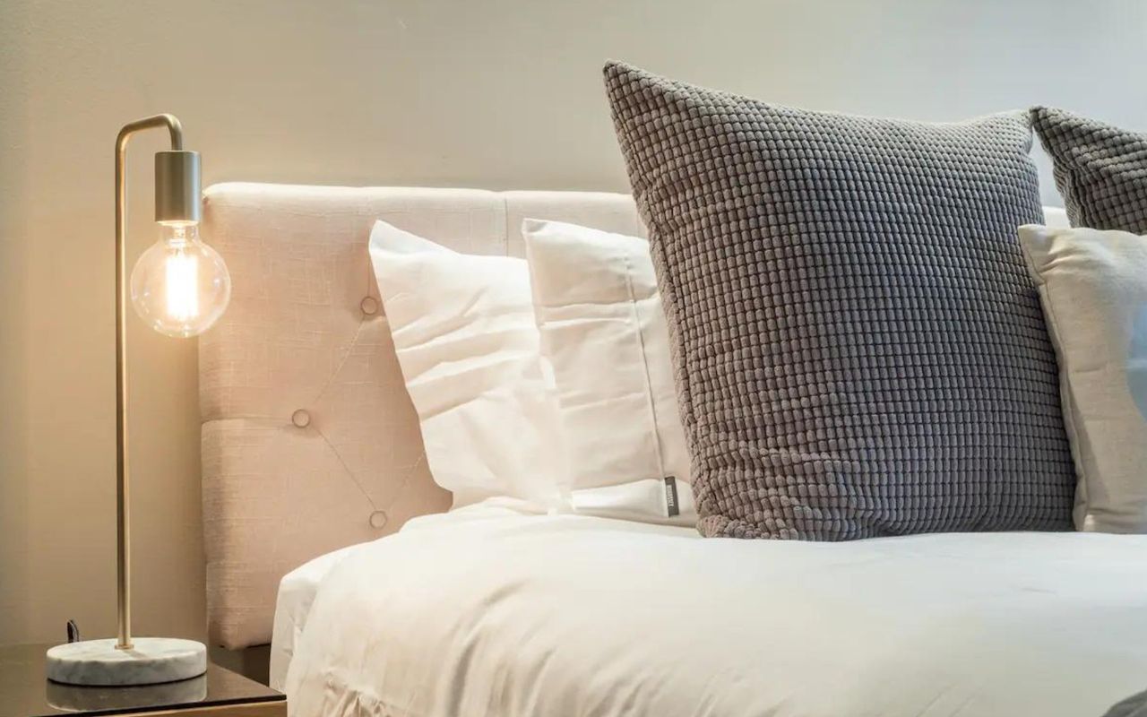 Rest and relaxation await in our elegantly appointed bedroom.