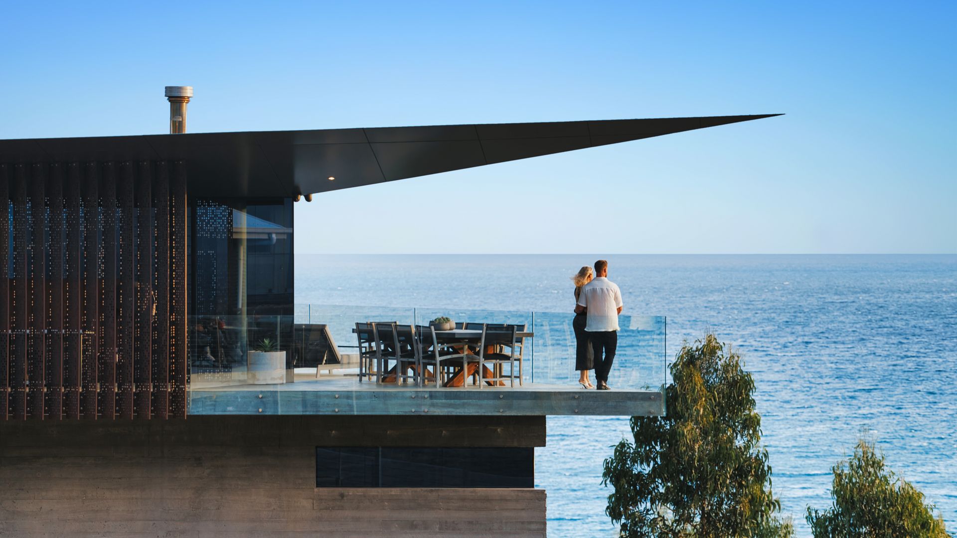 Expansive deck with seating and dining areas