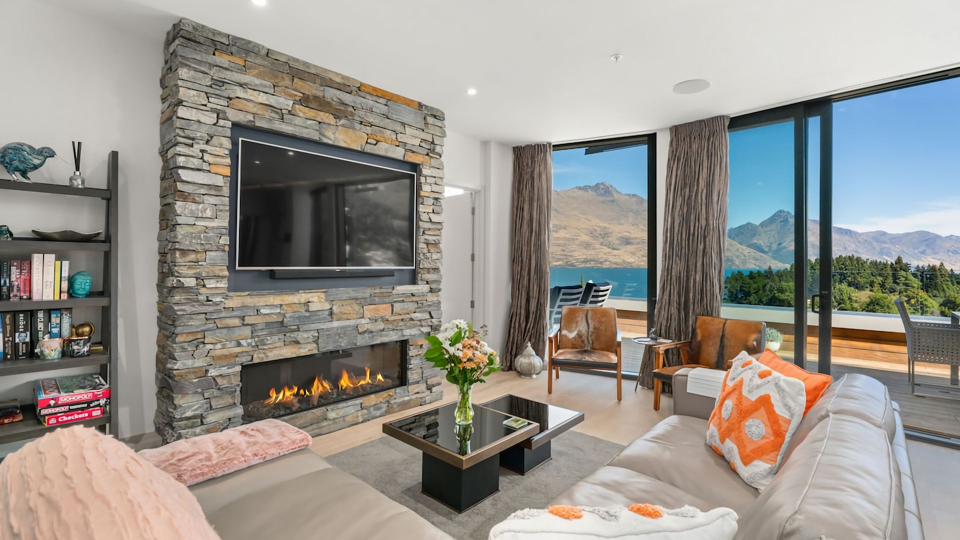 Living room with stunning views and cosy fireplace. 