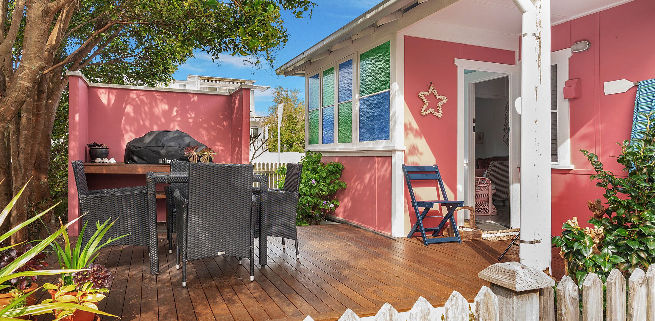 Breakfast, lunch and dinner under the trees with views to the beach. And a brilliant gas BBQ for your own sausage sizzle!