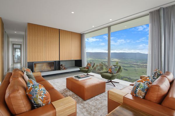 Main living area w/ wood fire & a view