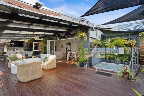 Large private deck with spa, tv, gas bbq, lounge and dining