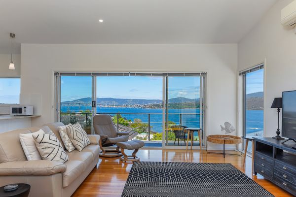 Deep Blue Wow views over river city mountain