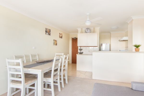 Kitchen with laundry and dining area