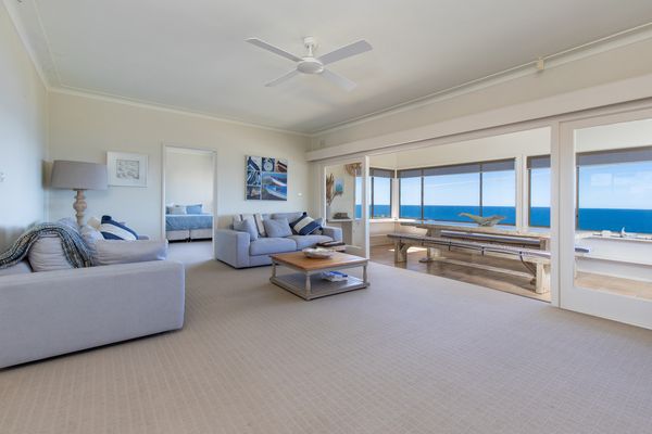 Living and dining room with ocean views