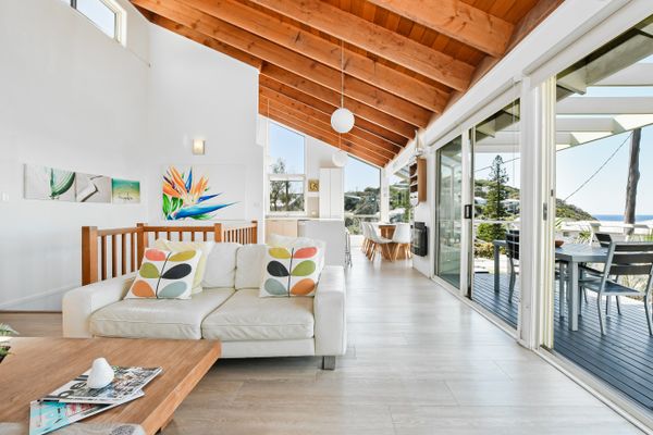 Living Room with Sofas and High Ceilings