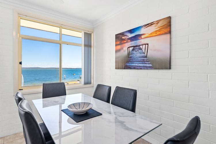 6 seater dinning table with a great beach view