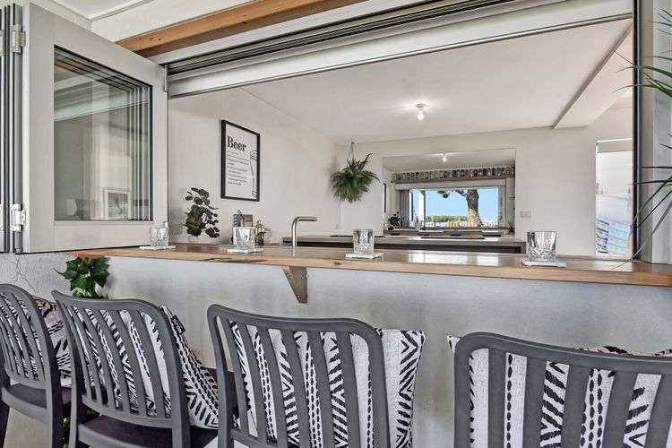 Reflections at Sunset Beach