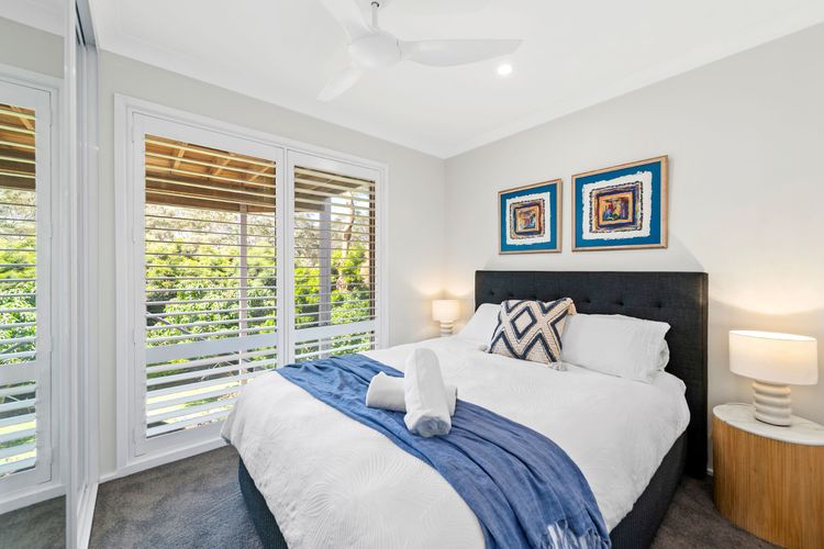 Bedroom 3 has a Queen bed, a built-in robe, a ceiling fan, and air-conditioning.