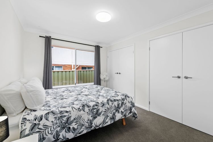 Bedroom 2: Queen bed and a built-in robe