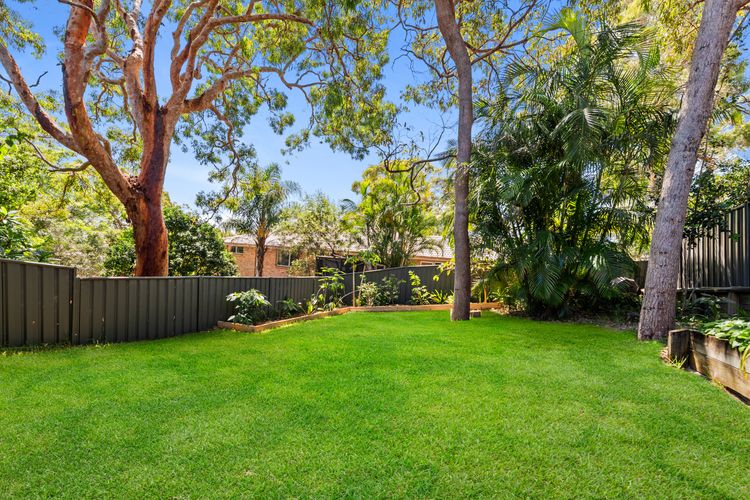 Beautiful grass garden with mature trees for added shade