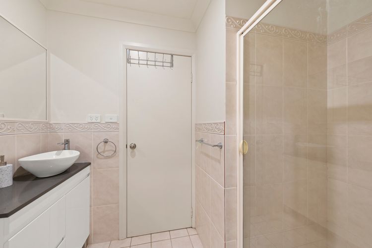 Large ensuite with shower, toilet and vanity