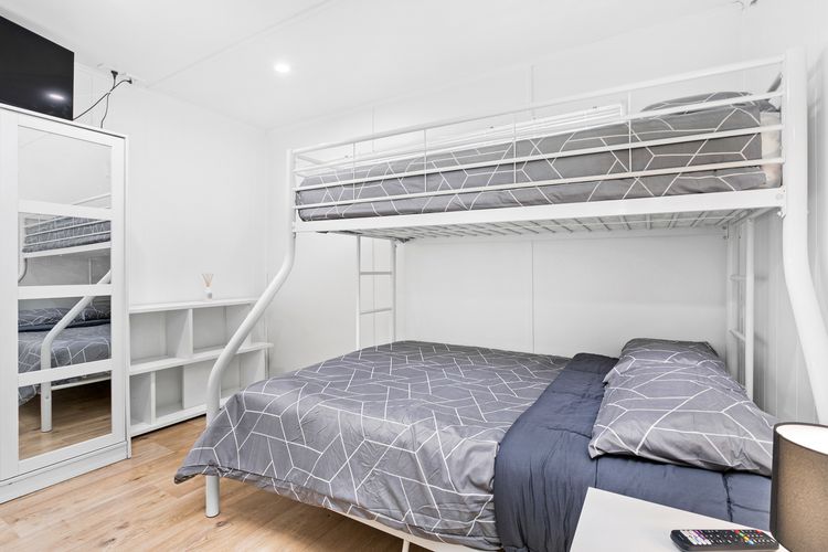 Bedroom with a Tri Bunk Bed (single over double)