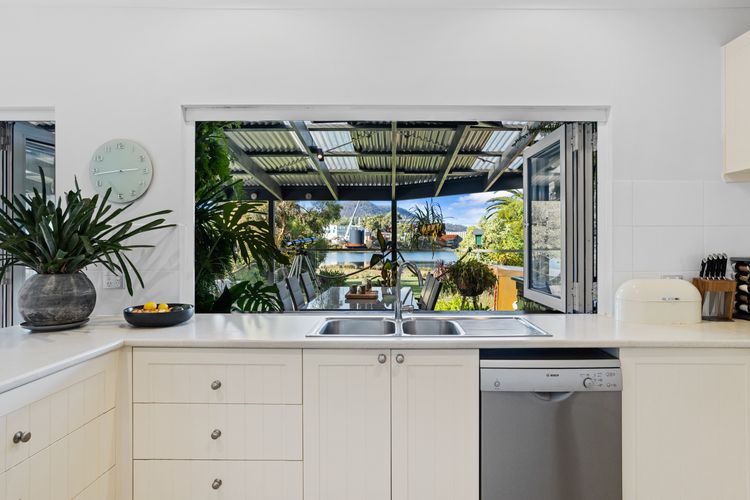 Bi-fold windows open to the deck