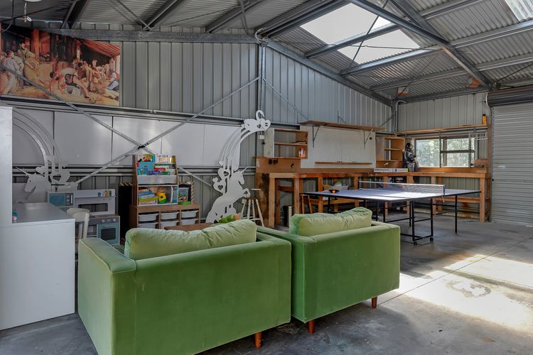 Spacious double garage with table tennis and plenty of kids toys for all ages.. Parking for one car in garage or can park 2 cars in driveway.