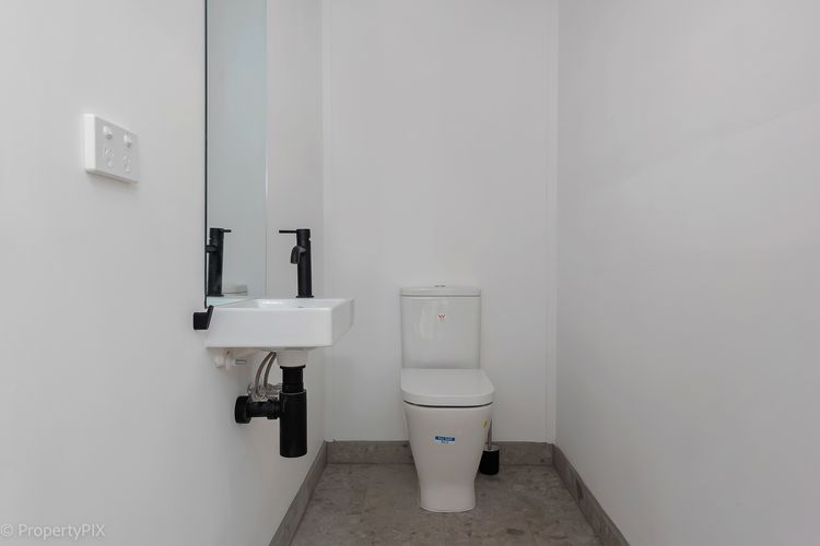 Toilet/powder room off courtyard