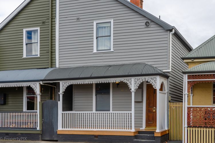 House facade (grey half of building)