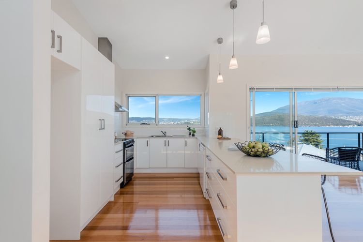 Deep Blue Wow views over river city mountain