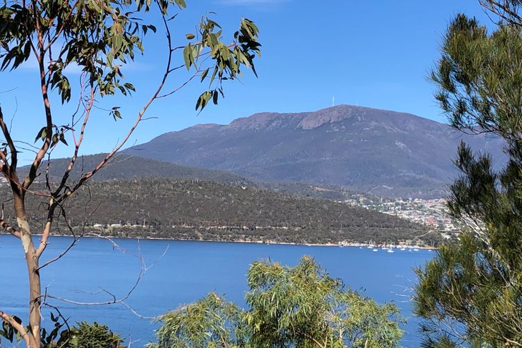 Deep Blue Wow views over river city mountain