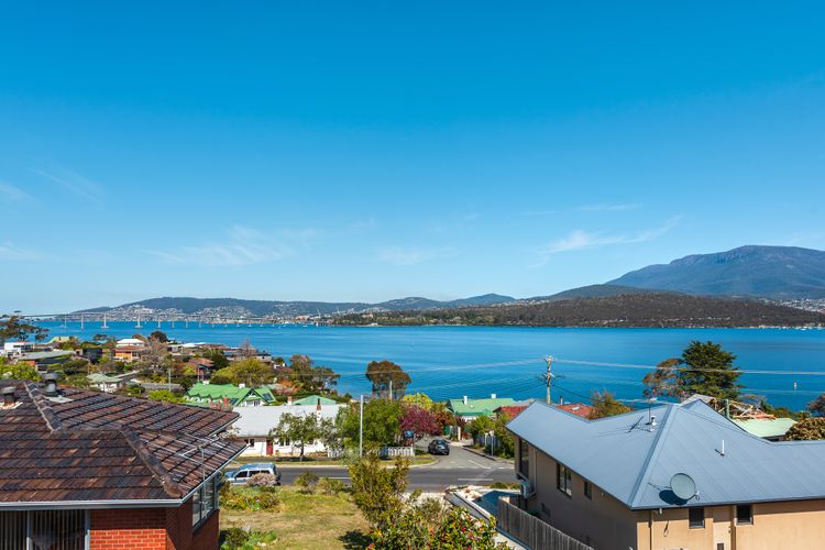 Deep Blue Wow views over river city mountain