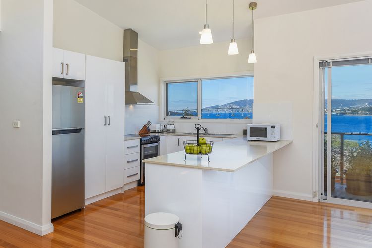 Deep Blue Wow views over river city mountain