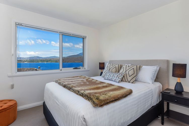 Deep Blue Wow views over river city mountain