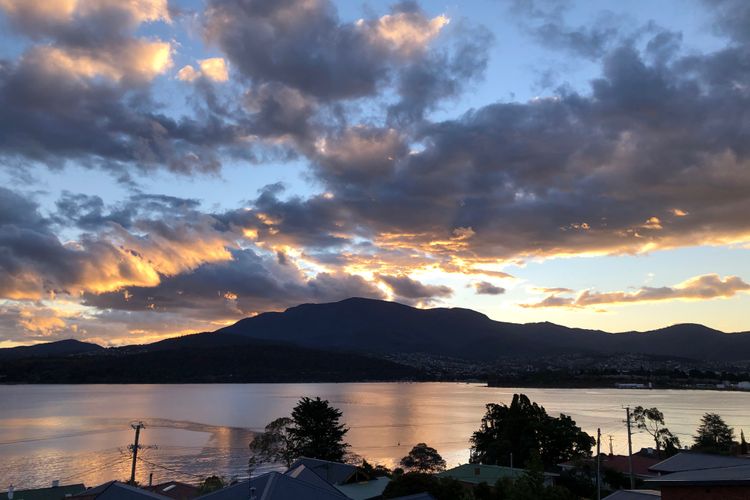 Deep Blue Wow views over river city mountain