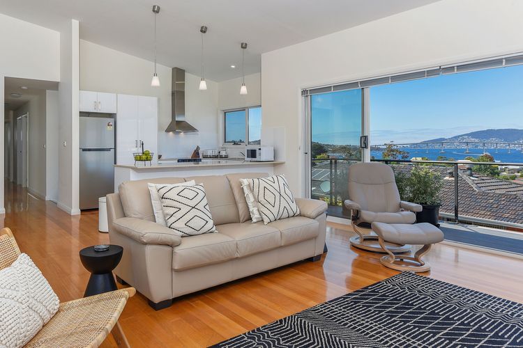 Deep Blue Wow views over river city mountain