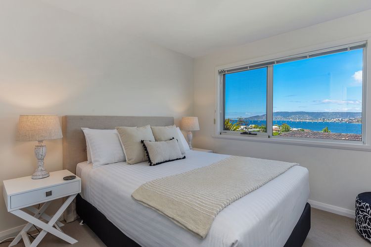 Deep Blue Wow views over river city mountain