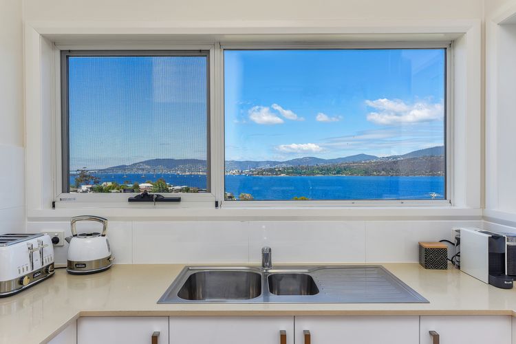 Deep Blue Wow views over river city mountain