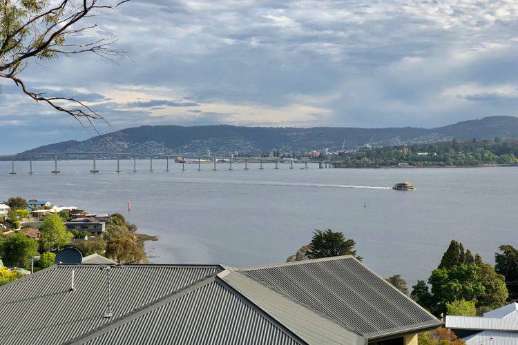 Deep Blue Wow views over river city mountain