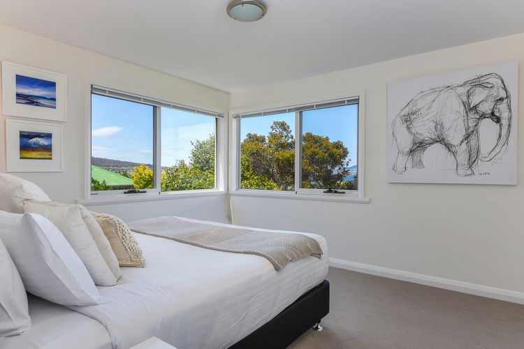 Deep Blue Wow views over river city mountain