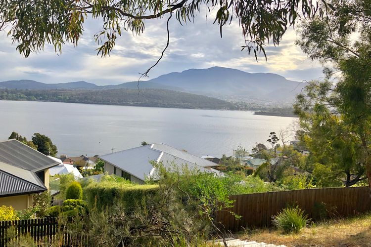 Deep Blue Wow views over river city mountain