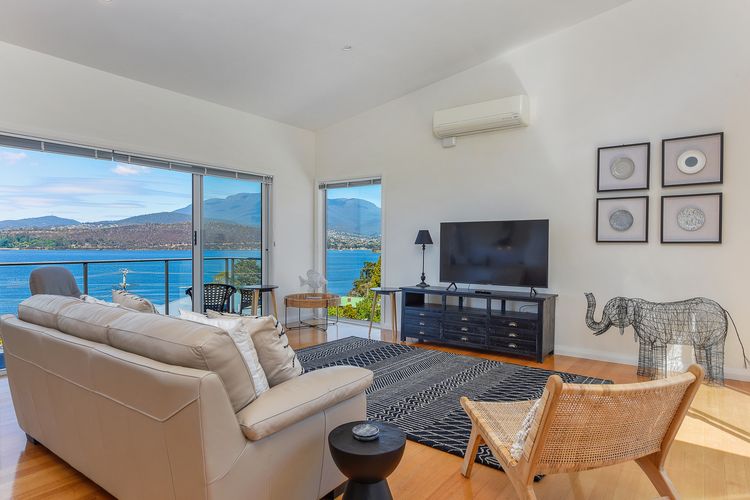 Deep Blue Wow views over river city mountain