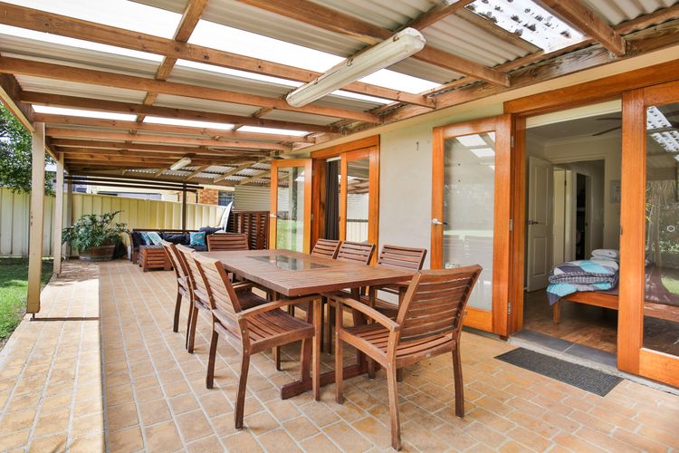 Covered Alfresco dining with outdoor lounge