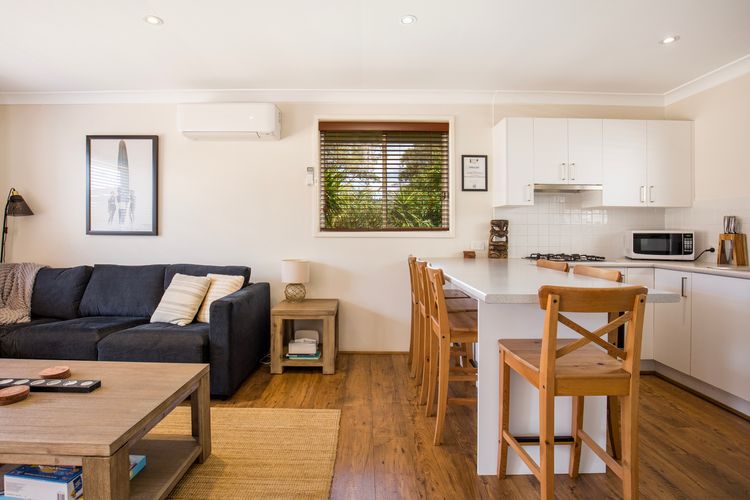 Dining for 6 adjacent to living area.