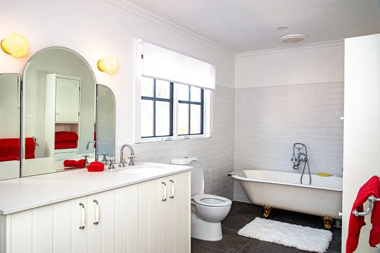 Enjoy a soak in the free standing bath with ocean views from the windows.