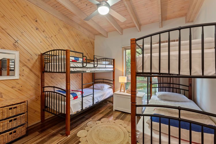 Bedroom 3: 2 Bunk beds with built-in robes.