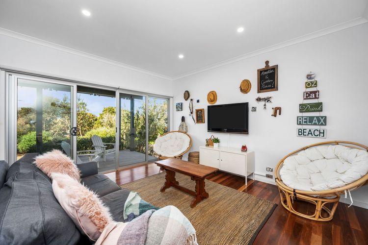 A living room, you can relax watching the Smart TV with WiFi and surround sound system.